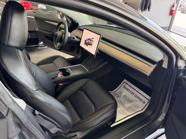 used 2023 Tesla Model 3 car, priced at $27,995