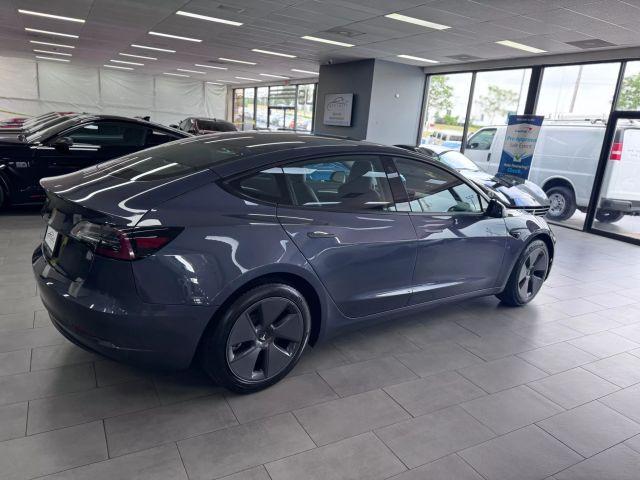 used 2023 Tesla Model 3 car, priced at $29,995