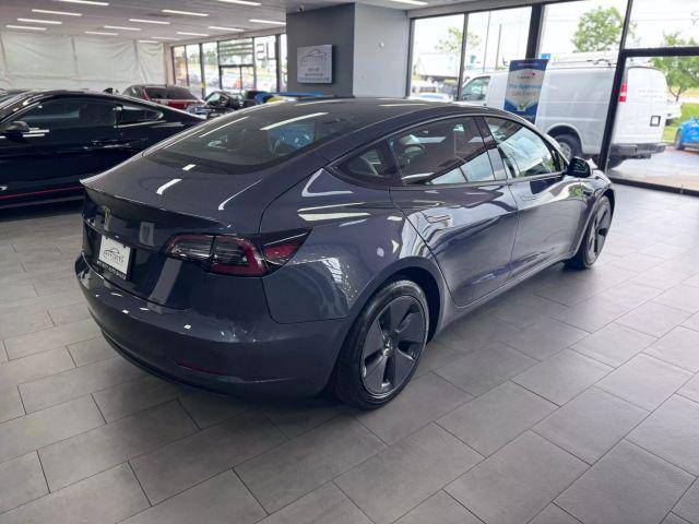 used 2023 Tesla Model 3 car, priced at $29,995