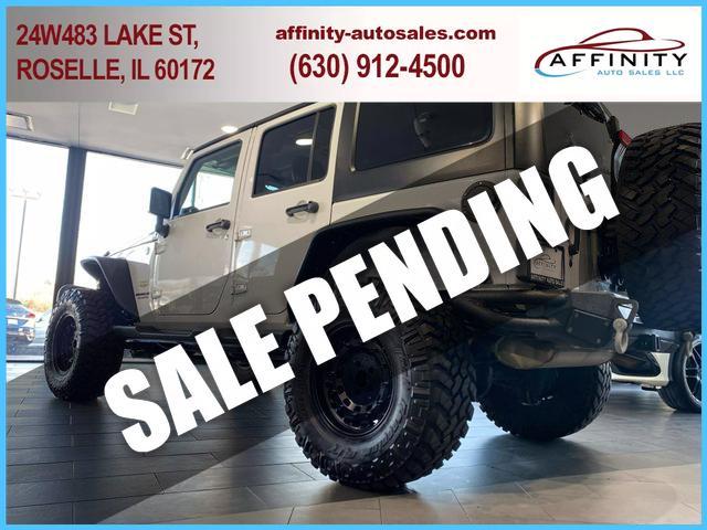 used 2015 Jeep Wrangler Unlimited car, priced at $26,995