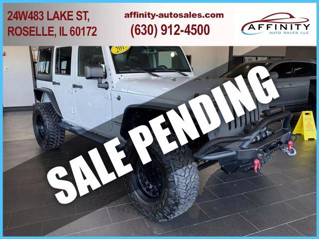 used 2015 Jeep Wrangler Unlimited car, priced at $26,995