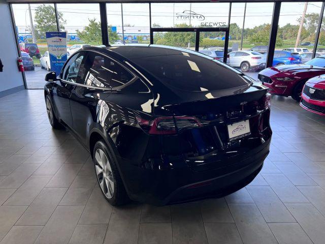 used 2023 Tesla Model Y car, priced at $32,995