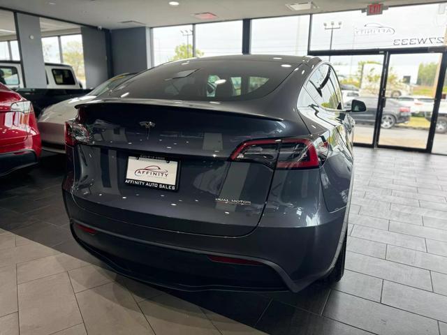 used 2023 Tesla Model Y car, priced at $36,995