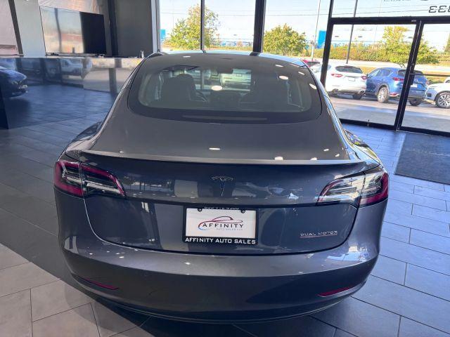 used 2022 Tesla Model 3 car, priced at $20,995