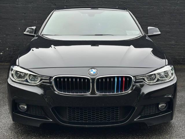 used 2018 BMW 330 car, priced at $26,995