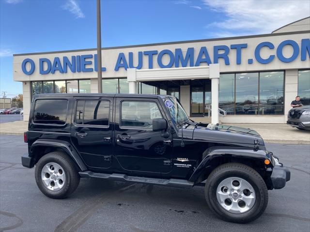 used 2014 Jeep Wrangler Unlimited car, priced at $18,298