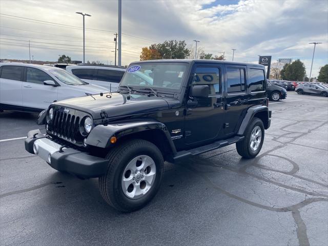 used 2014 Jeep Wrangler Unlimited car, priced at $18,298