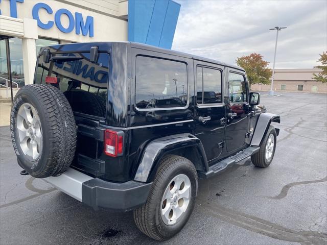 used 2014 Jeep Wrangler Unlimited car, priced at $18,298