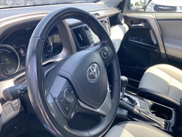 used 2018 Toyota RAV4 Hybrid car, priced at $23,295