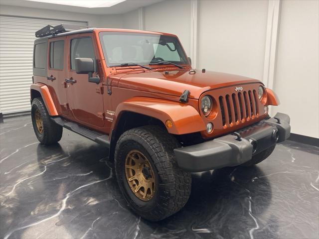 used 2014 Jeep Wrangler Unlimited car, priced at $17,699