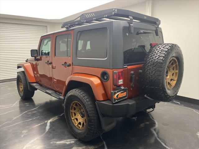 used 2014 Jeep Wrangler Unlimited car, priced at $17,699