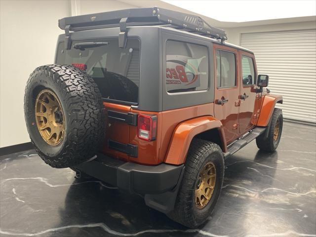 used 2014 Jeep Wrangler Unlimited car, priced at $17,699