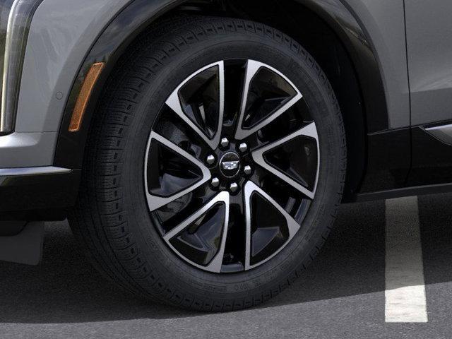 new 2025 Cadillac OPTIQ car, priced at $55,990