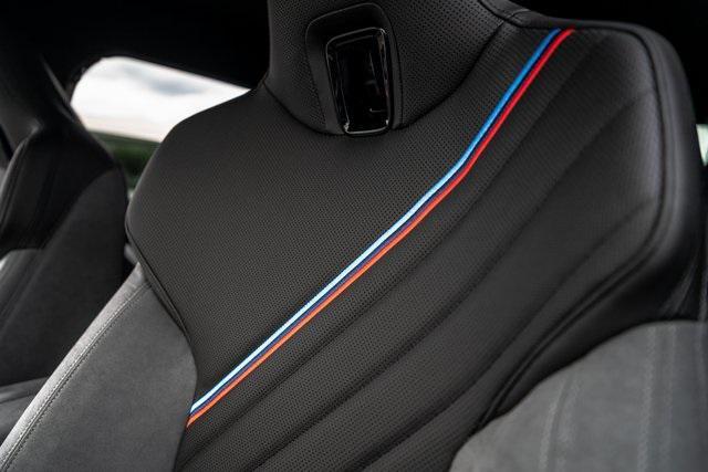 new 2026 BMW iX car, priced at $90,175