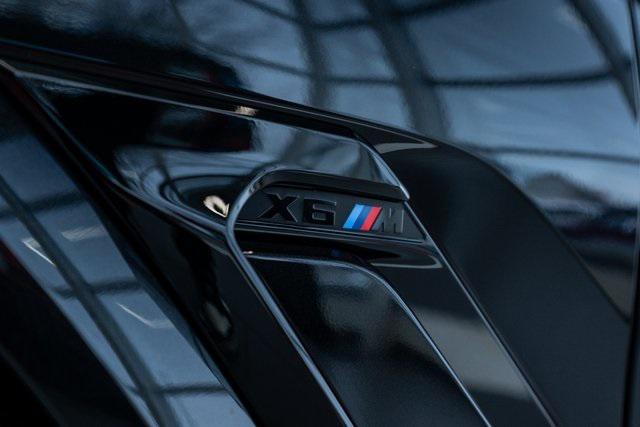 new 2025 BMW X6 M car, priced at $138,075