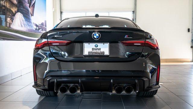 used 2024 BMW M4 car, priced at $80,261