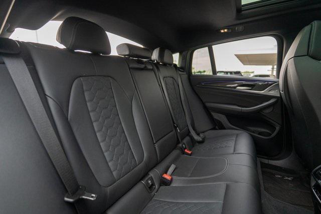 used 2024 BMW X4 M car, priced at $74,697
