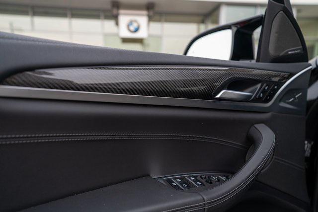 used 2024 BMW X4 M car, priced at $74,697