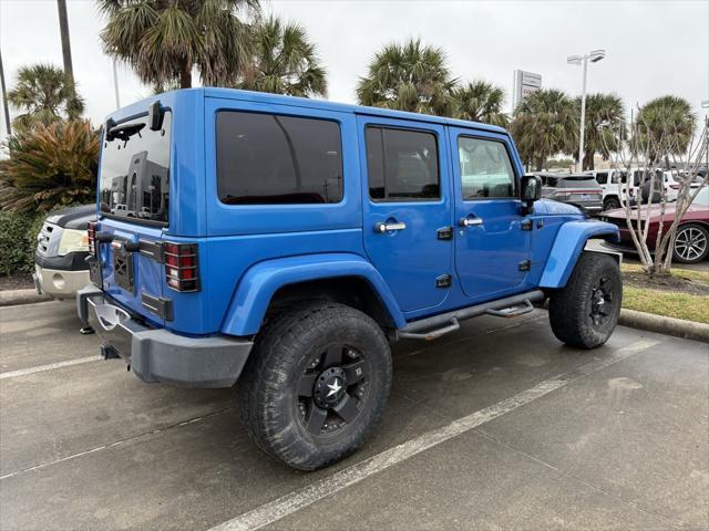 used 2015 Jeep Wrangler Unlimited car, priced at $17,433