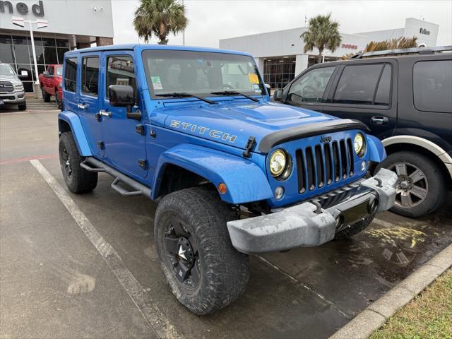 used 2015 Jeep Wrangler Unlimited car, priced at $17,433