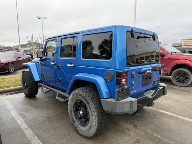 used 2015 Jeep Wrangler Unlimited car, priced at $17,433