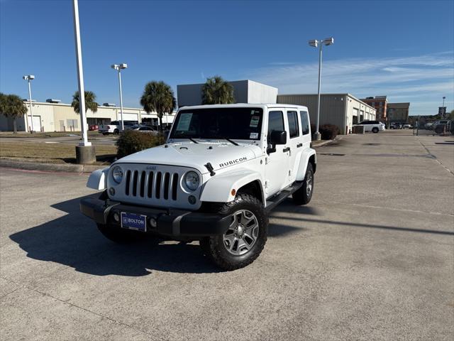 used 2015 Jeep Wrangler Unlimited car, priced at $21,801