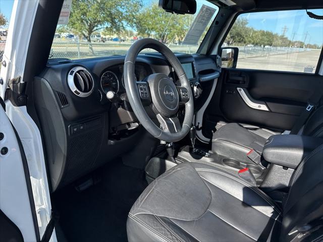 used 2015 Jeep Wrangler Unlimited car, priced at $21,538