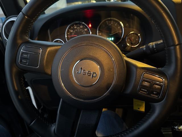 used 2014 Jeep Wrangler Unlimited car, priced at $20,997