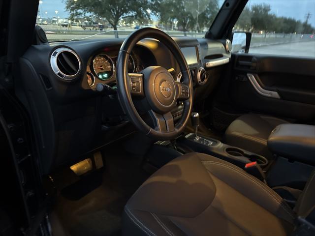 used 2014 Jeep Wrangler Unlimited car, priced at $20,997