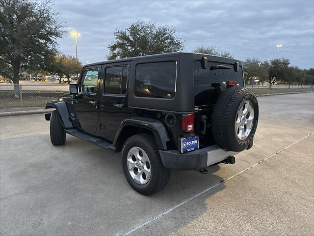 used 2014 Jeep Wrangler Unlimited car, priced at $20,997