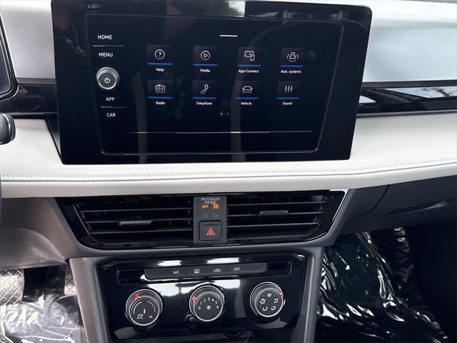used 2025 Volkswagen Taos car, priced at $25,299
