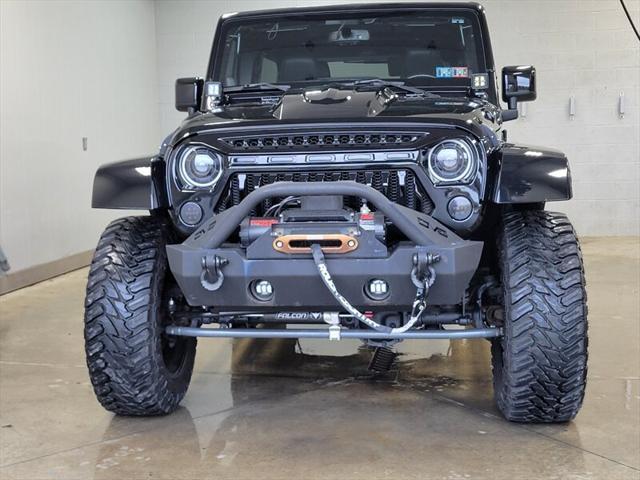 used 2014 Jeep Wrangler Unlimited car, priced at $25,865