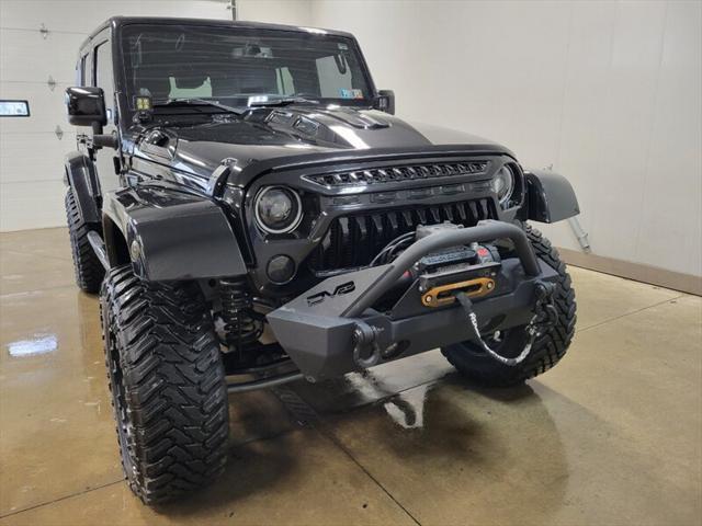 used 2014 Jeep Wrangler Unlimited car, priced at $25,865