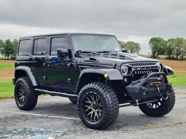 used 2014 Jeep Wrangler Unlimited car, priced at $25,865