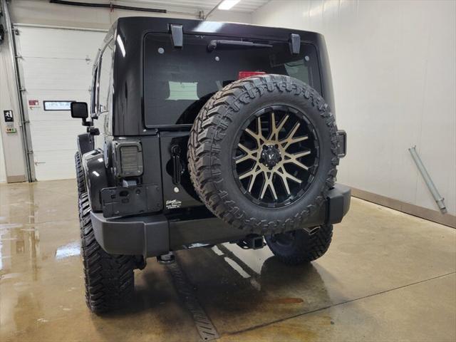 used 2014 Jeep Wrangler Unlimited car, priced at $25,865