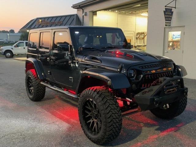 used 2014 Jeep Wrangler Unlimited car, priced at $25,865