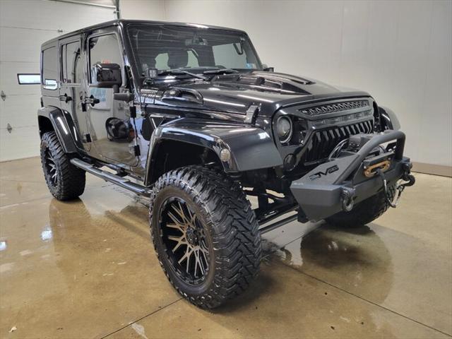 used 2014 Jeep Wrangler Unlimited car, priced at $25,865