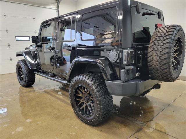 used 2014 Jeep Wrangler Unlimited car, priced at $25,865