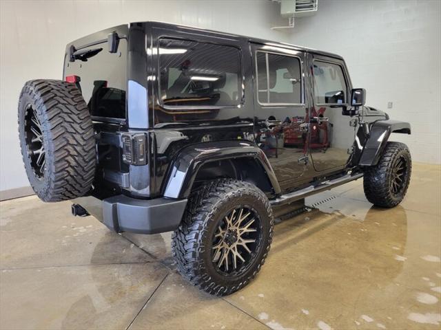 used 2014 Jeep Wrangler Unlimited car, priced at $25,865