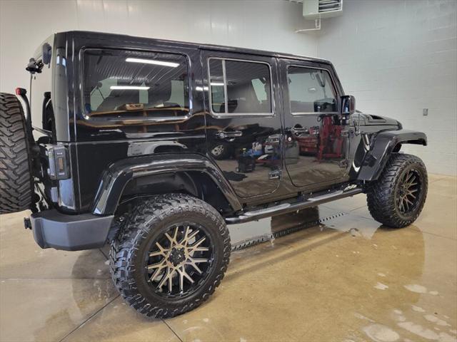 used 2014 Jeep Wrangler Unlimited car, priced at $25,865