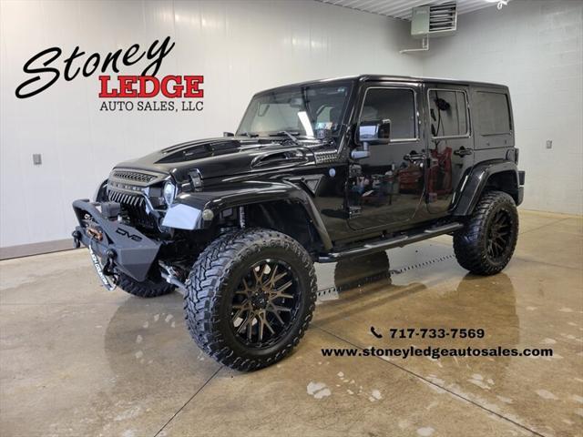 used 2014 Jeep Wrangler Unlimited car, priced at $25,865