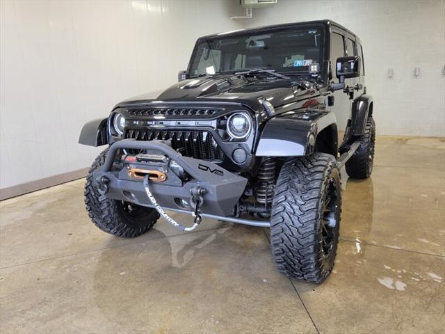 used 2014 Jeep Wrangler Unlimited car, priced at $25,865