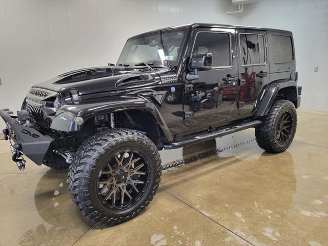 used 2014 Jeep Wrangler Unlimited car, priced at $25,865