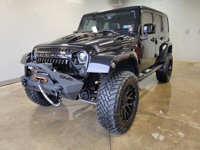 used 2014 Jeep Wrangler Unlimited car, priced at $25,865