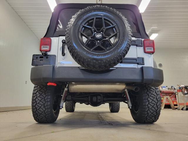 used 2014 Jeep Wrangler Unlimited car, priced at $20,985