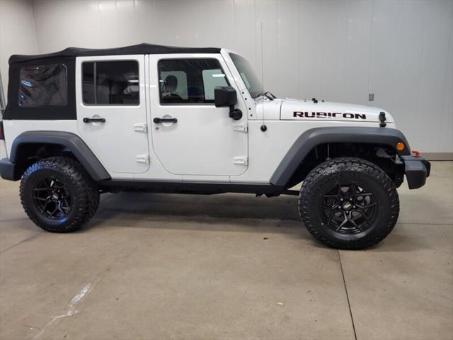 used 2014 Jeep Wrangler Unlimited car, priced at $20,985