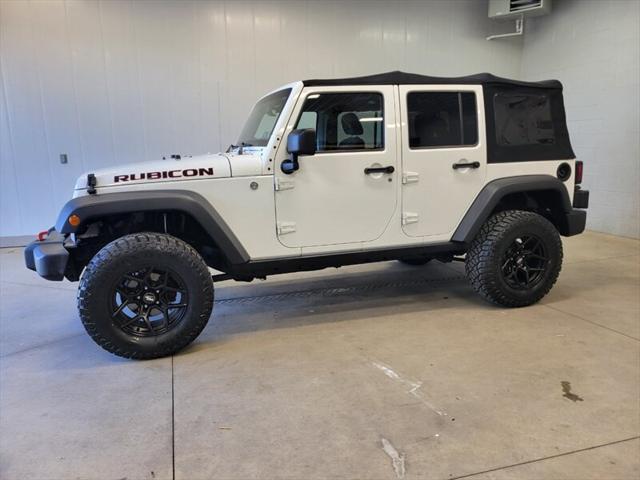 used 2014 Jeep Wrangler Unlimited car, priced at $20,985