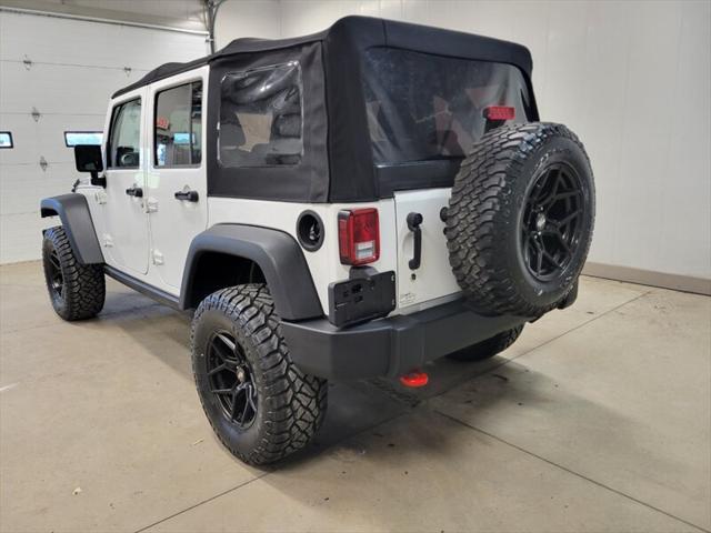 used 2014 Jeep Wrangler Unlimited car, priced at $20,985