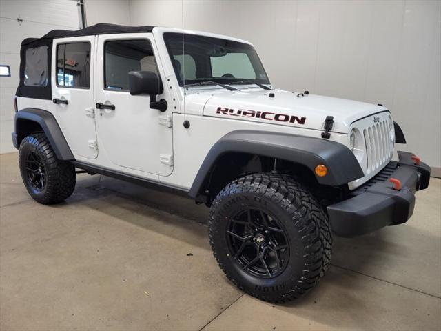 used 2014 Jeep Wrangler Unlimited car, priced at $20,985