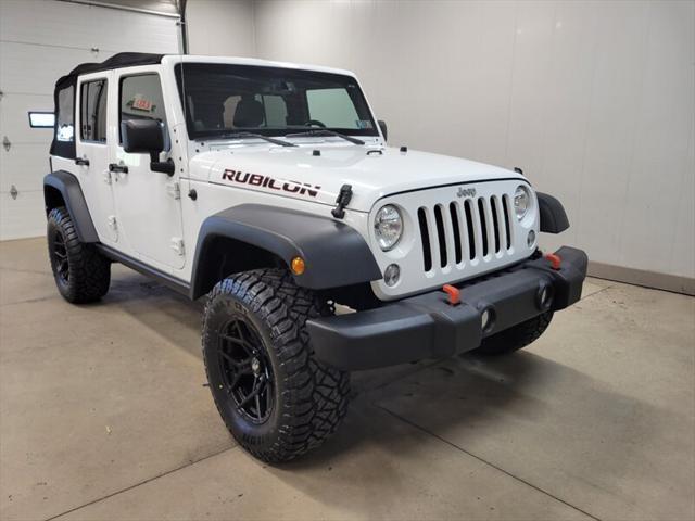 used 2014 Jeep Wrangler Unlimited car, priced at $20,985